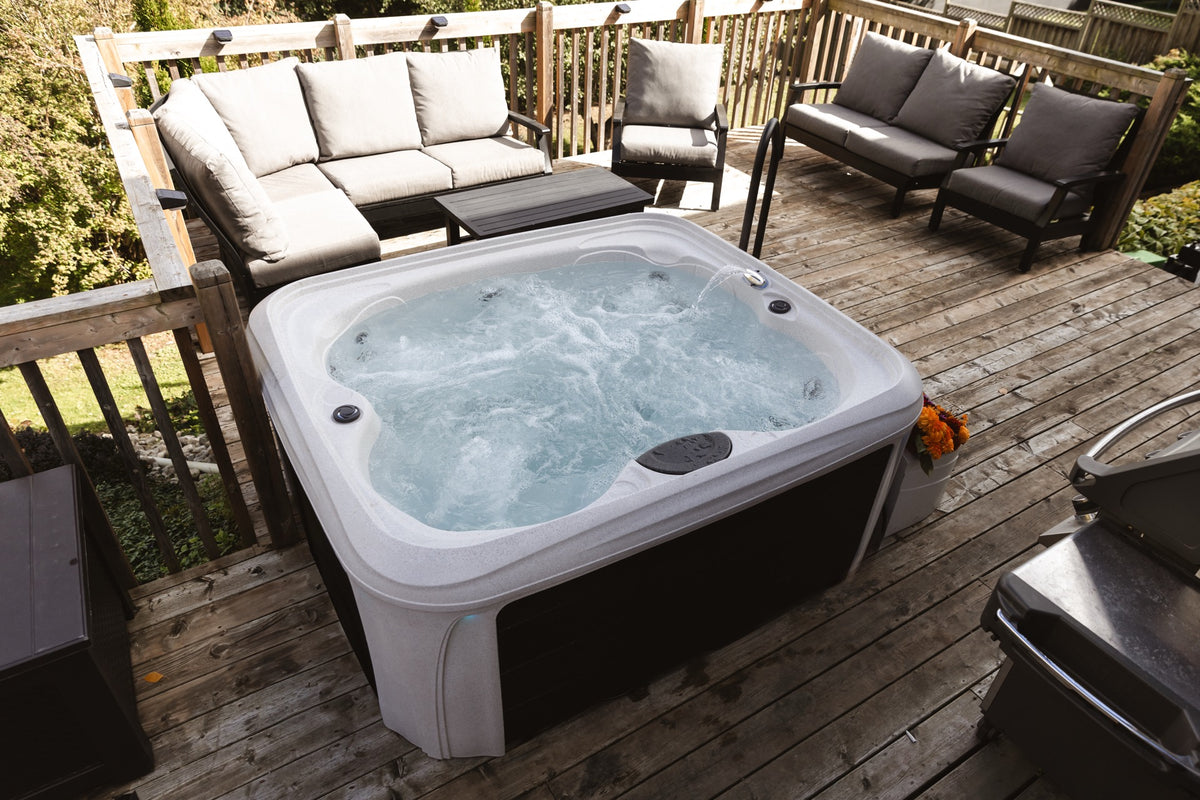 Dream Maker Comfort hot tub installed on a furnished wooden deck